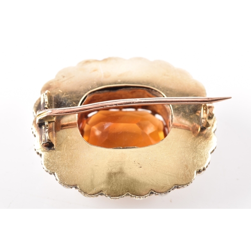 49 - A yellow gold citrine and pearl brooch, centred with a large rectangular cushion cut citrine in a cl... 