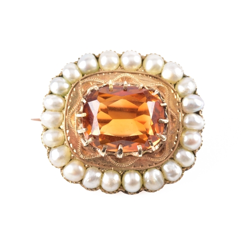 49 - A yellow gold citrine and pearl brooch, centred with a large rectangular cushion cut citrine in a cl... 
