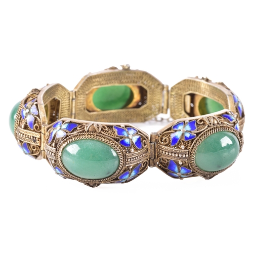 50 - A silver gilt Chinese export cloisonne fiigree bracelet featuring jadeite cabochons, surrounded by b... 