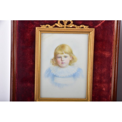 236 - A late Victorian portrait of a lady, depicting a lady with a fine pearl hair pin, wearing a pastel c... 