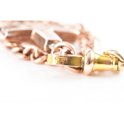56 - A 9ct rose gold curb link bracelet, fitted with a 9ct yellow gold clasp, suspended with a gilt metal... 
