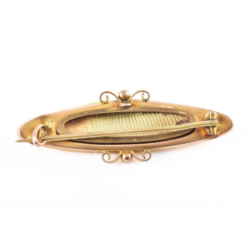 58 - A Victorian 9ct yellow gold synthetic sapphire and seed pearl brooch, featuring decorative metalwork... 