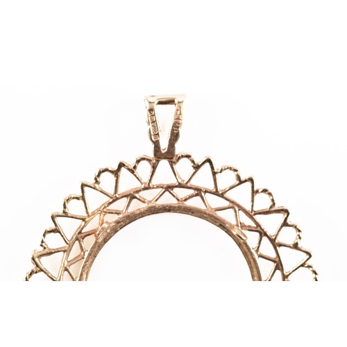 112 - An Edward VII 1906 gold full sovereign, accompanied by a 9ct yellow gold fitted gold mount featuring... 