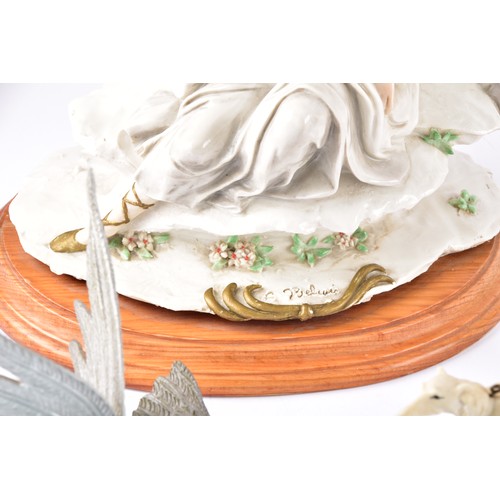 338 - A large collection of ceramics and figurines, including a Marco Giner Spain porcelain lady with flow... 