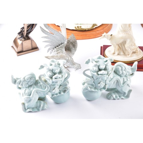 338 - A large collection of ceramics and figurines, including a Marco Giner Spain porcelain lady with flow... 