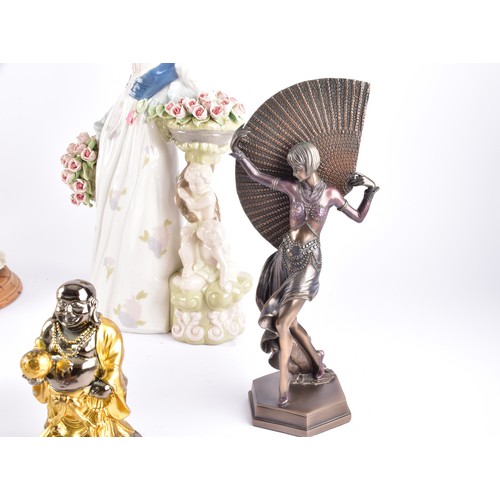 338 - A large collection of ceramics and figurines, including a Marco Giner Spain porcelain lady with flow... 