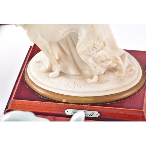 338 - A large collection of ceramics and figurines, including a Marco Giner Spain porcelain lady with flow... 