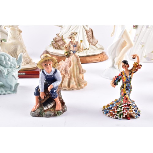 338 - A large collection of ceramics and figurines, including a Marco Giner Spain porcelain lady with flow... 