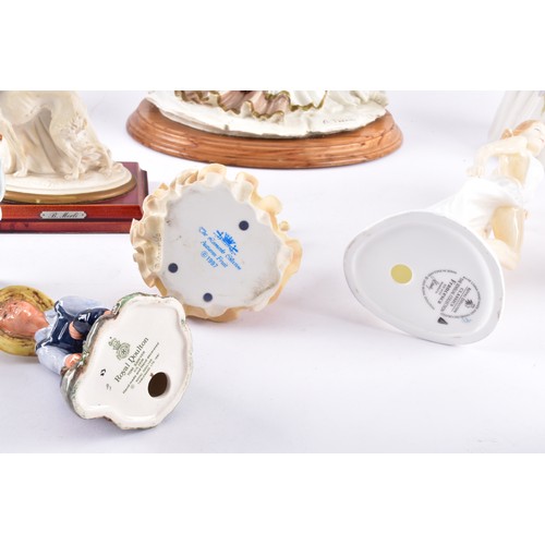 338 - A large collection of ceramics and figurines, including a Marco Giner Spain porcelain lady with flow... 