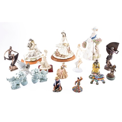 338 - A large collection of ceramics and figurines, including a Marco Giner Spain porcelain lady with flow... 