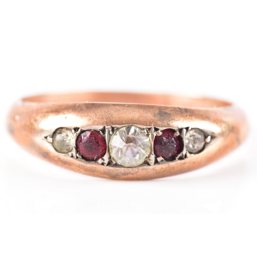 64 - A 9ct rose gold pink and white paste five stone ring, size O.