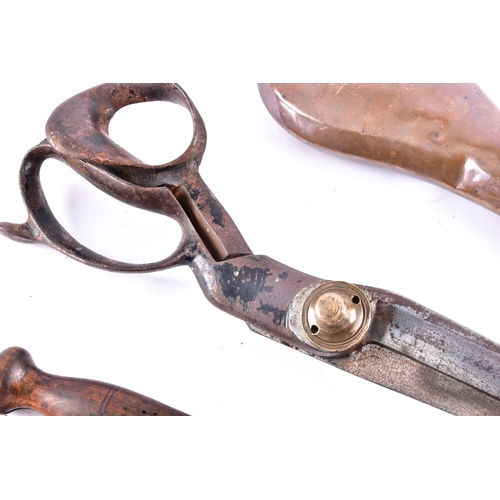 215 - A 19th century Sykes powder flask, a pair of tailor's shears by Thomas Wilkinson & Son Sheffield... 
