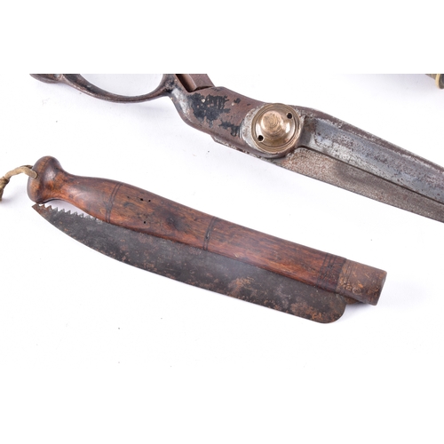 215 - A 19th century Sykes powder flask, a pair of tailor's shears by Thomas Wilkinson & Son Sheffield... 