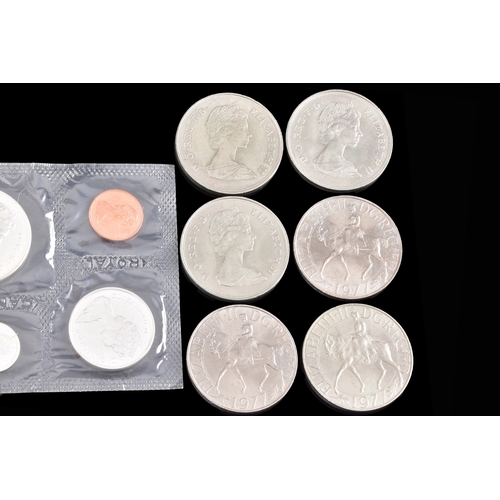 99 - A collection of coins, including four cased United Kingdom silver proof one pound coins, a cased 197... 