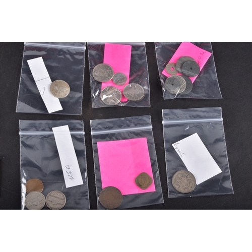 99 - A collection of coins, including four cased United Kingdom silver proof one pound coins, a cased 197... 