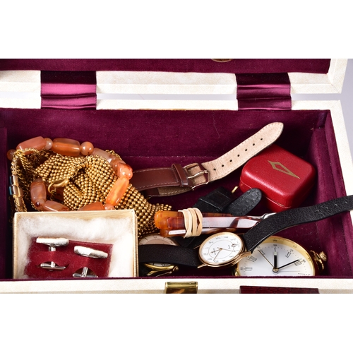 48 - A large collection of costume jewellery, cufflinks, brooches, watches, tie clips, travel clocks, nec... 