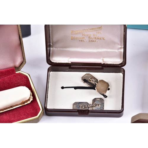 48 - A large collection of costume jewellery, cufflinks, brooches, watches, tie clips, travel clocks, nec... 