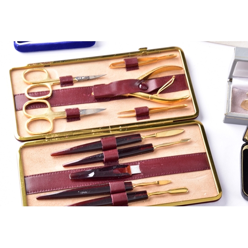 48 - A large collection of costume jewellery, cufflinks, brooches, watches, tie clips, travel clocks, nec... 