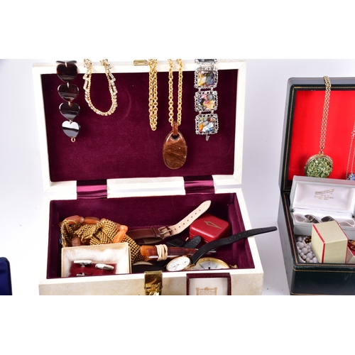 48 - A large collection of costume jewellery, cufflinks, brooches, watches, tie clips, travel clocks, nec... 