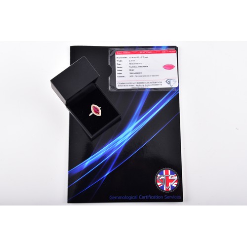 24 - A natural and unheated Mozambique ruby 18ct yellow gold and platinum marquise cluster ring, set to t... 