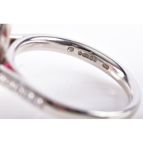 24 - A natural and unheated Mozambique ruby 18ct yellow gold and platinum marquise cluster ring, set to t... 