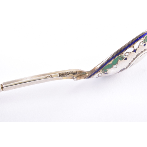 186 - A David Anderson cruet set, the bottle tops decorated with silver and engine turned pink and purple ... 