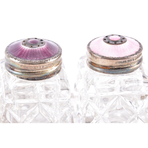 186 - A David Anderson cruet set, the bottle tops decorated with silver and engine turned pink and purple ... 