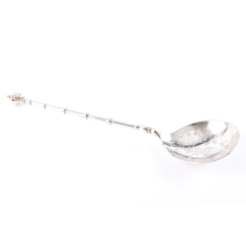 187 - A late 18th/early 19th century Swedish spoon, the bowl finely engraved with foliate scrollwork and s... 