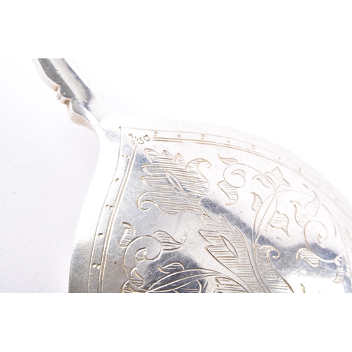 187 - A late 18th/early 19th century Swedish spoon, the bowl finely engraved with foliate scrollwork and s... 