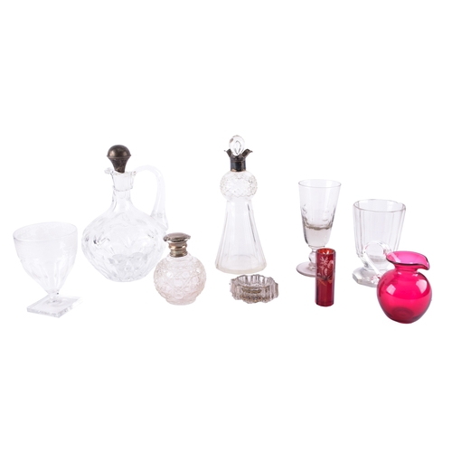 199 - A mixed group of late 19th to early 20th century glassware, including a cut glass decanter with a si... 