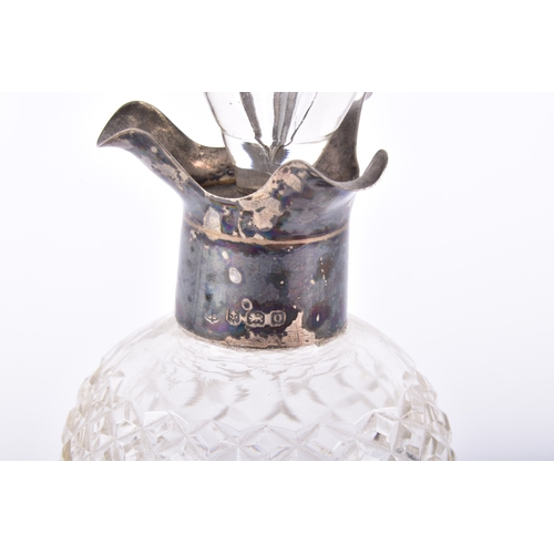 199 - A mixed group of late 19th to early 20th century glassware, including a cut glass decanter with a si... 