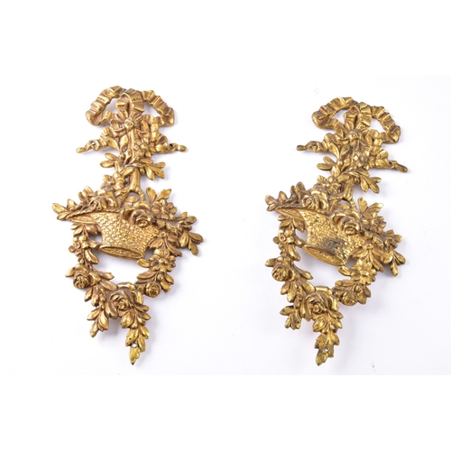 342 - A collection of decorative arts including a pair of large brass altar candlesticks, with turned stem... 