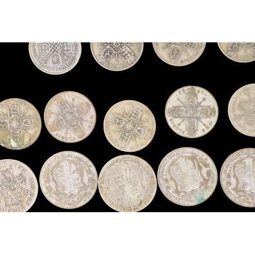 106 - A large collection of pre 1947 silver GB coins includding Half Crowns, Florins, three pence coins, a... 