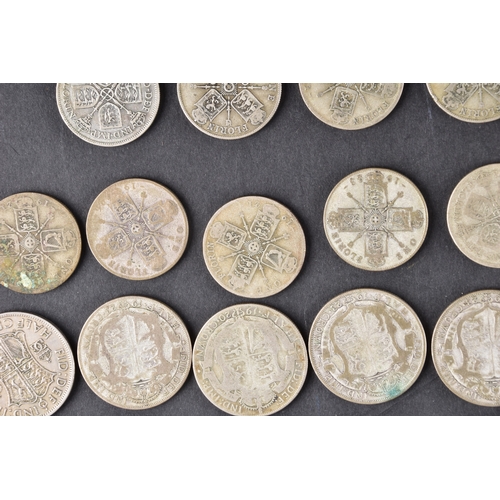 106 - A large collection of pre 1947 silver GB coins includding Half Crowns, Florins, three pence coins, a... 