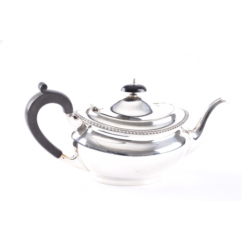 197 - A George V silver creamer hallmarked for Birmingham 1912 by T H Hazlewood & Co, 6.5 cm high, a G... 