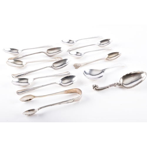 202 - A collection of assorted silver teaspoons, including British teaspoons, a caddy spoon, a Danish cadd... 