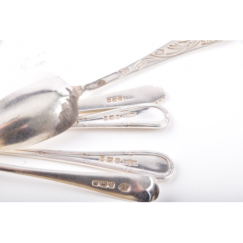 202 - A collection of assorted silver teaspoons, including British teaspoons, a caddy spoon, a Danish cadd... 