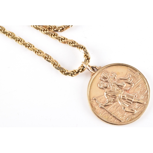 78 - A 9ct yellow gold St. Christopher pendant suspended on a fancy link chain, pendant hallmarked for Lo... 