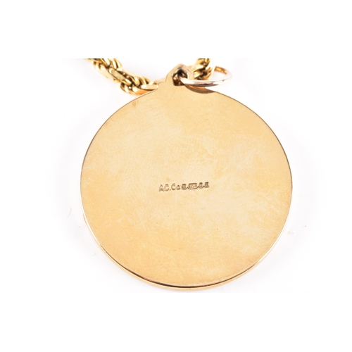 78 - A 9ct yellow gold St. Christopher pendant suspended on a fancy link chain, pendant hallmarked for Lo... 