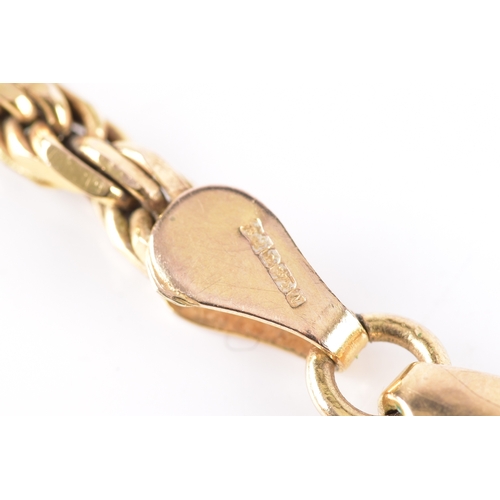 78 - A 9ct yellow gold St. Christopher pendant suspended on a fancy link chain, pendant hallmarked for Lo... 