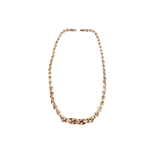 83 - A 9ct yellow gold textured graduating link chain, import marks for London 1976 by 'NB', 45 cm long.