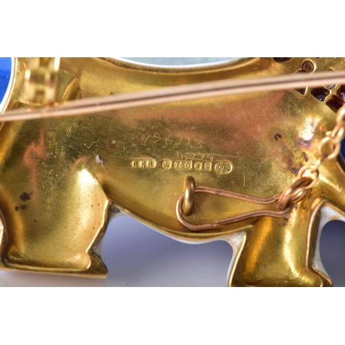 6 - An 18ct yellow gold brooch in the form of a Scottie dog / Scottish Terrier, decorated with white ena... 
