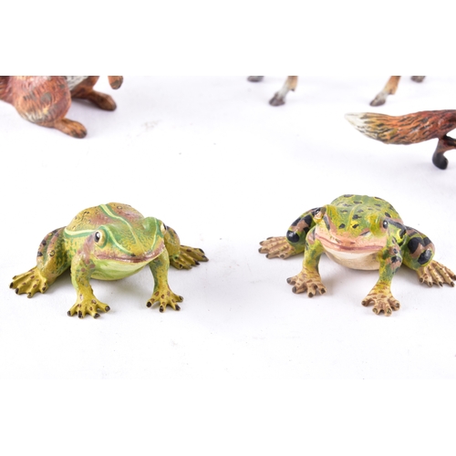 344 - A collection of Mappin & Webb bronze animals, including a pair of bronze frogs, together with a ... 