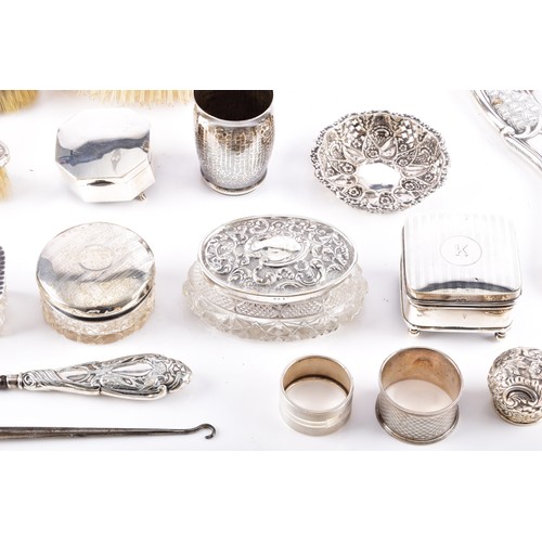 208 - A gold pearl and diamond pin, collection of assorted silver dressing table items including one set c... 