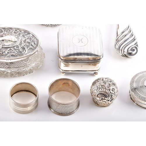 208 - A gold pearl and diamond pin, collection of assorted silver dressing table items including one set c... 