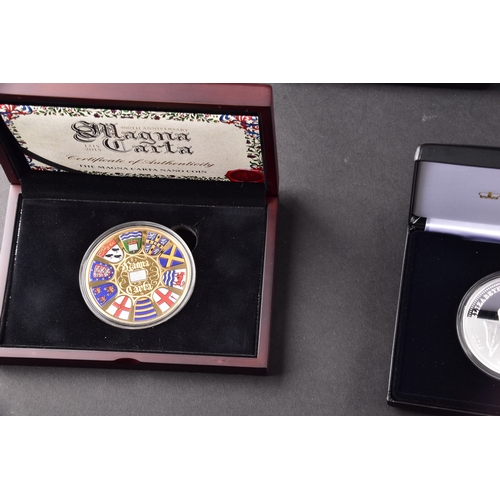 113 - A mixed collection of modern commemorative issues, including a cased Magna Carta 800th Anniversary s... 