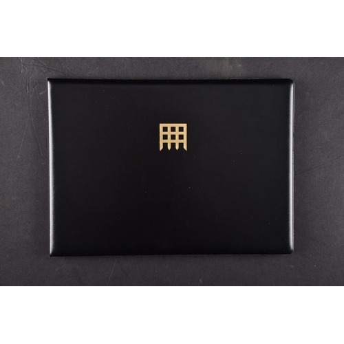 114 - A collection of commemorative coin covers and stamp collections, including a Queen Elizabeth II 65th... 