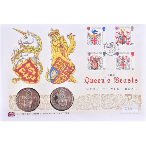 114 - A collection of commemorative coin covers and stamp collections, including a Queen Elizabeth II 65th... 