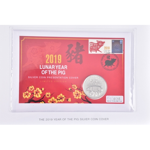 114 - A collection of commemorative coin covers and stamp collections, including a Queen Elizabeth II 65th... 