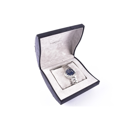 121 - A Longines Conquest S100, quartz stainless steel wristwatch, the blue dial having baton markers and ... 
